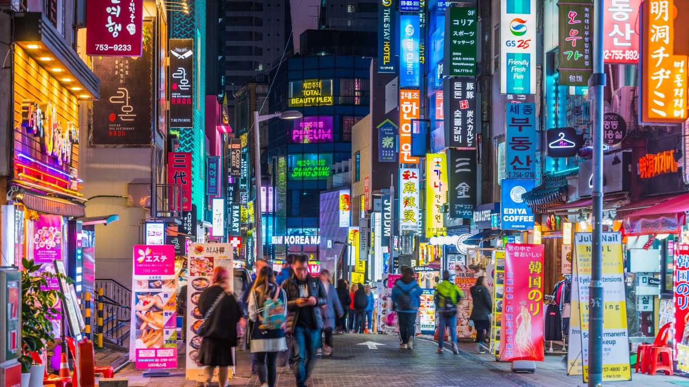 Neon night shopping street Myeong-dong shopping district panorama Seoul Korea